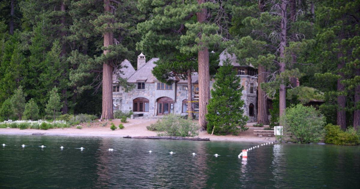 The lakeside Vikingsholm historic site set within a forest of tall evergreens in Lake Tahoe